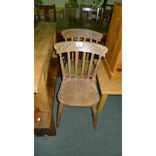 152 - 2 wooden dining chairs