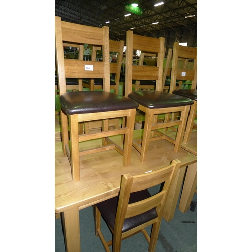 184 - 4 oak ladder back dining chairs with brown upholstered seat pads