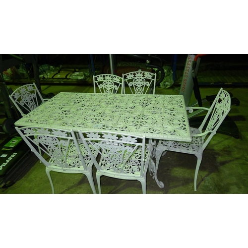 28 - A white painted metal garden table and 6 matching chairs