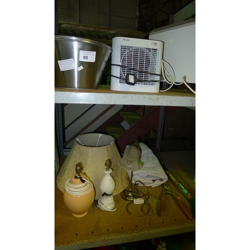 95 - A quantity of various items including 2 heaters, 2 lamps etc. Contents of two shelves (Trade)