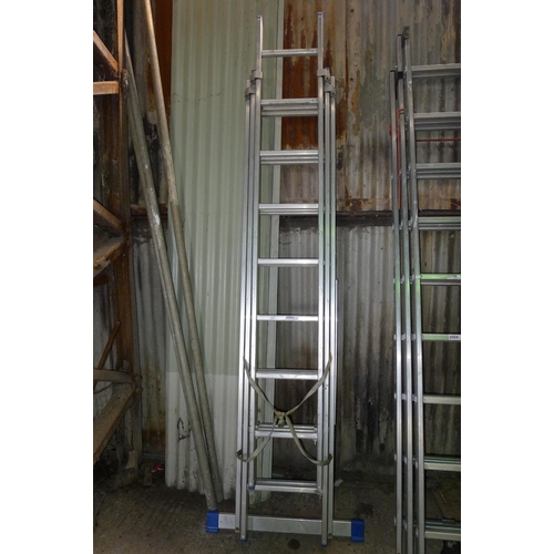 2063 - A set of triple extending aluminium ladders by Zarges (8 tread)