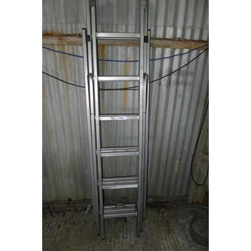 2067 - A set of triple extending aluminium ladders by Hailo type Profilot Combi (6 tread)