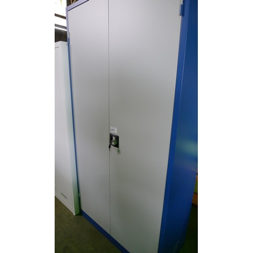 2071 - 1 blue / grey metal two door storage cabinet with two low shelves, hanging panels etc. Key is with s... 