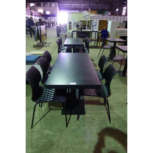 1733 - 11 black plastic stacking chairs