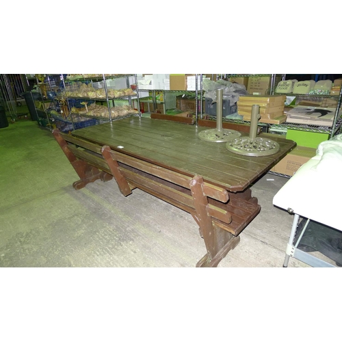 46 - 1 large wooden garden table with 1 large bench, 2 smaller benches and 2 parasol bases (no parasols i... 