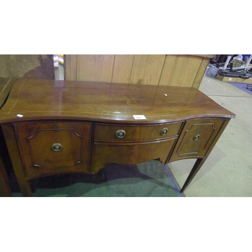 701 - A mahogany Serpentine front sideboard with two central drawers and two side cupboards