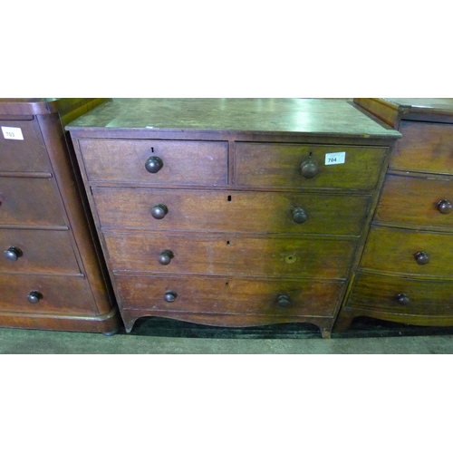 704 - A Victorian mahogany chest of two short and three long drawers with turned knobs