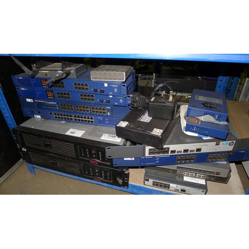 60 - 2 rack mount uninterruptible power supplies by APC and a quantity of various switches / hubs by Netg... 