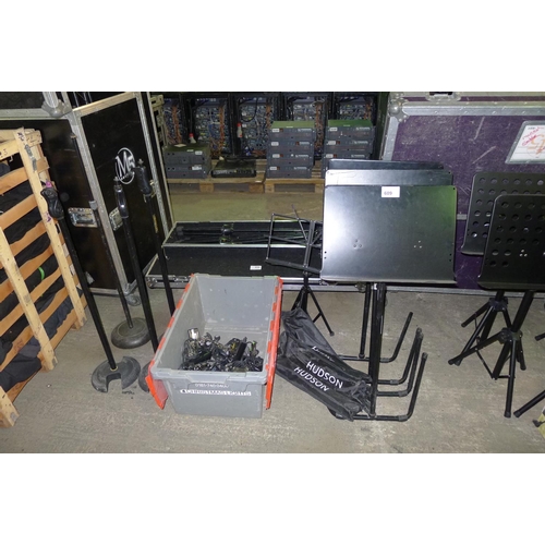 609 - A quantity of various music and other stands together with a quantity of music stand lights (plastic... 