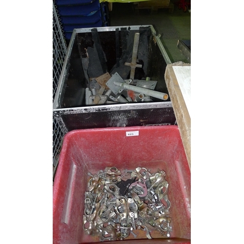 623 - A quantity of adjustable metal feet & a quantity of scaffold type clips - the two containers are inc... 