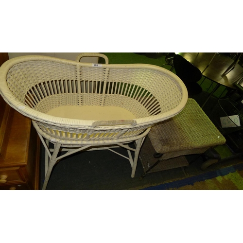 102 - 1 Moses basket with stand and 1 wicker coffee table