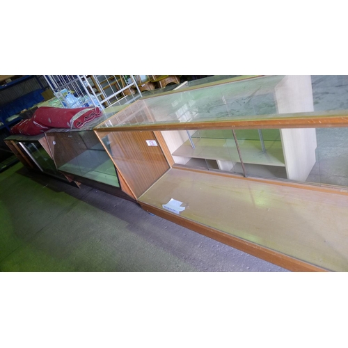 34 - 2 wide glass display cabinets