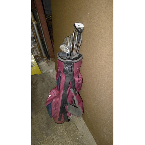 97 - One golf bag containing various clubs