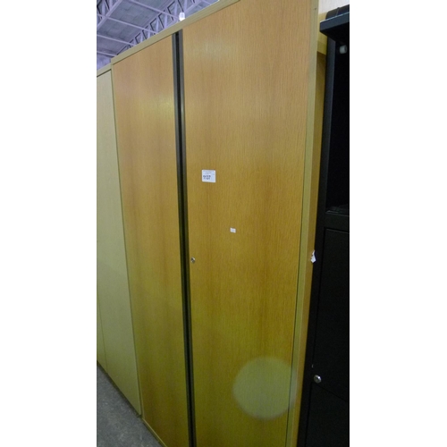 1137 - 1 tall wood effect two door storage cabinet