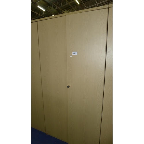 1143 - 1 tall wood effect two door storage cabinet by Morris