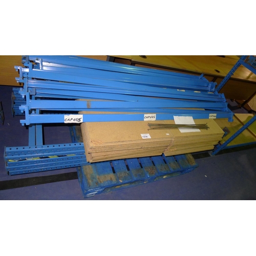 1230 - A run of 4 bays (5 uprights) of blue metal boltless stores type racking with chipboard shelves each ... 