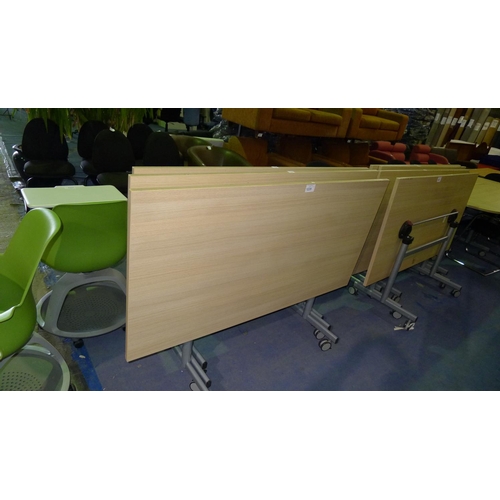 1235 - 3 wood effect rectangular wheeled office tables with tipping  tops