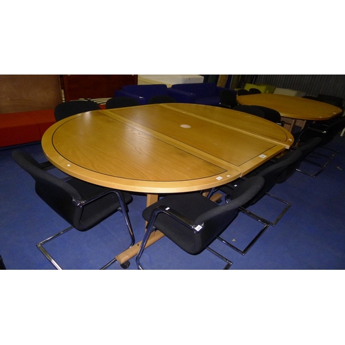 1240 - A 3 section  wood effect meeting room table with black inlay comprising of 1 wheeled rectangular tab... 