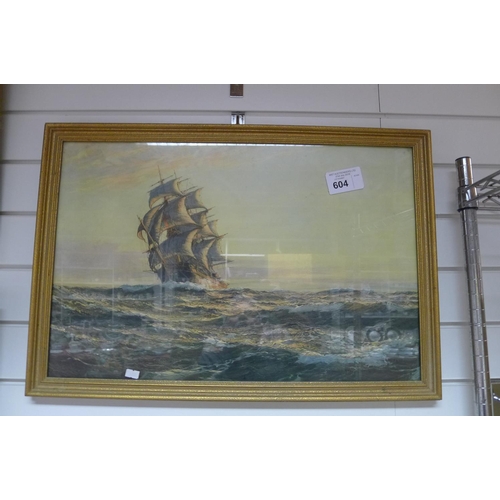 604 - A framed print of a square rigger at sea