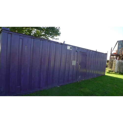 2540 - A metal anti vandal 3 room site mess / canteen container approx 9.75m x 3.03m (32 foot) with key