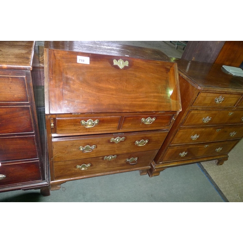 719 - A Georgian mahogany bureau with a fall front enclosing fitted interior, 2 short and 2 long drawers u... 