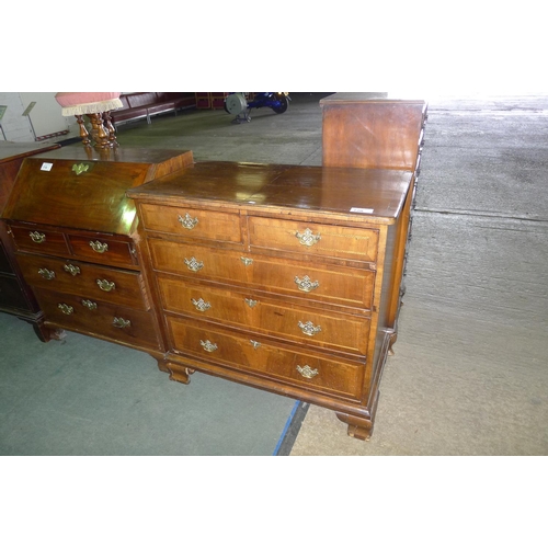 720 - An early inlaid mahogany chest of 2 short and 3 long graduated drawers with cock beading, brass drop... 