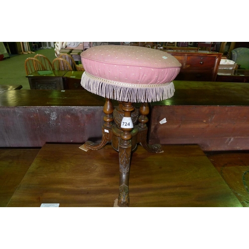 724 - An Edwardian mahogany circular top upholstered music stool with 3 splayed legs