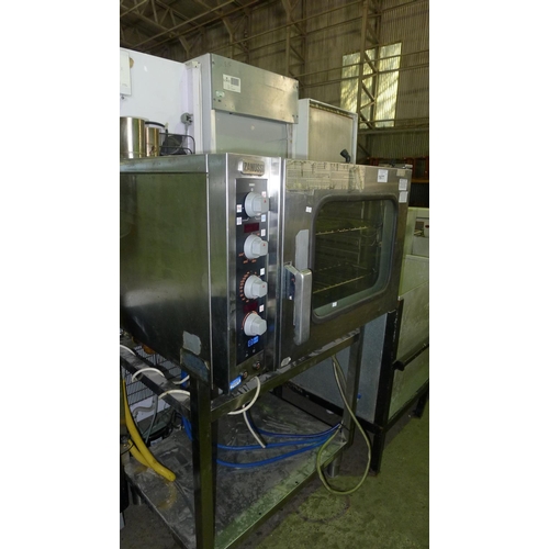 1677 - a commercial stainless steel convection oven by Zanussi type: FCV-G6L3BO, comes on stand 240v/gas - ... 