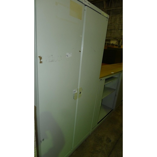 1067 - 1 grey metal 2 door storage cabinet approx 6ft by 3ft