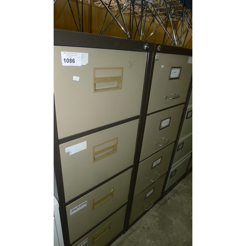 1086 - 2 metal 4 drawer filing cabinets