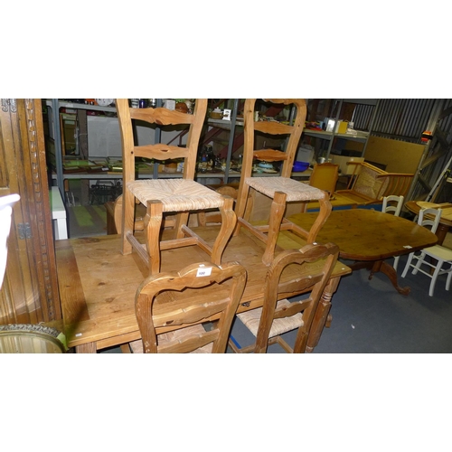 100 - 1 pine dining table and 6 Chairs with rush seats