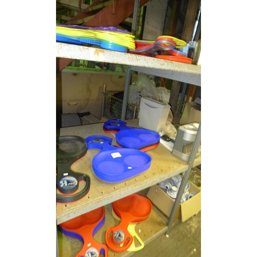 84 - A quantity of various small plastic sledges by KHW. Contents of one bay / 3 shelves