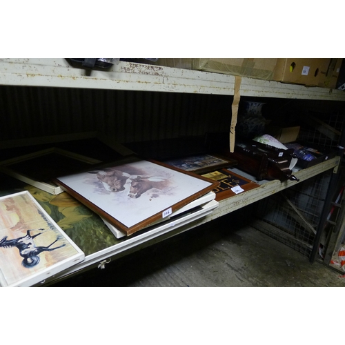 106 - [cat alt] A quantity of horse prints, a clock, car accessories  etc. Contents of 1 shelf