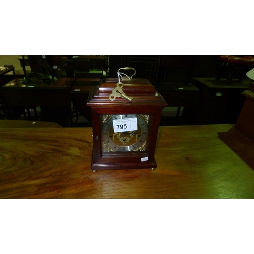 795 - Reproduction mahogany bracket clock with a decorated face