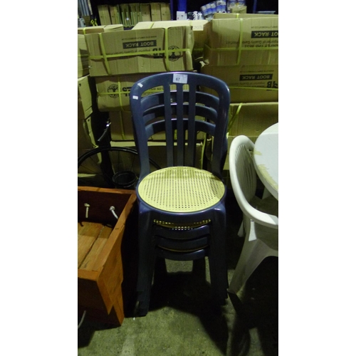 67 - 4 plastic stacking chairs