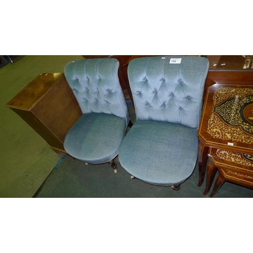 752 - A pair of Victorian blue button backed upholstered nursing chairs