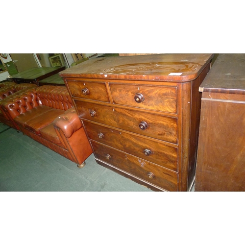 754 - A Victorian mahogany chest with 2 short and 3 long graduated drawers with cock beading and turns kno... 