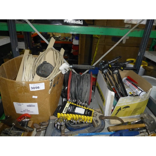 3056 - A quantity of various items including hand tools, an extension lead, clamps etc. Contents of one bay... 