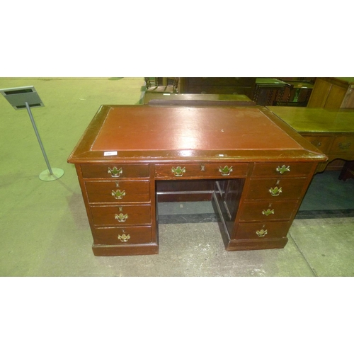 747 - A brown stain rectangular topped twin pedestal office desk with drawers and brass drop handles