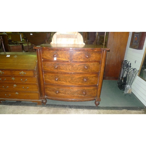 752 - A Victorian mahogany bow fronted chest of 2 short and 3 long graduated drawers