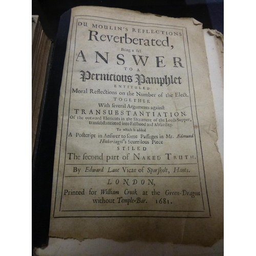 596 - A leather bound volume of Swifts works dated 1735 and a volume of Du Moulin's reflections dated 1681