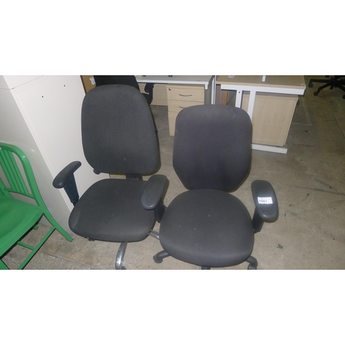 1061 - Two black upholstered office swivel chairs