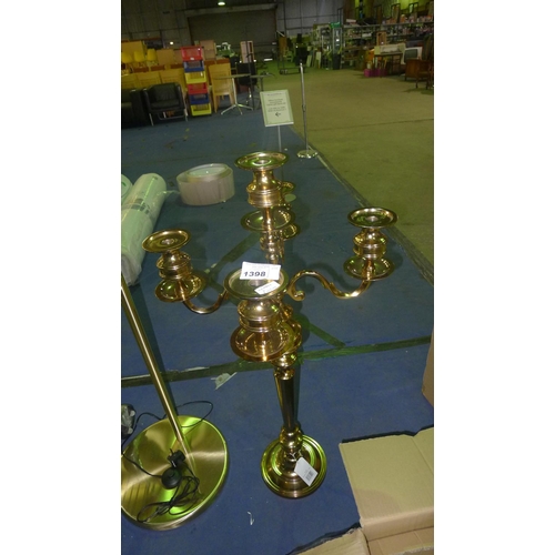 1398 - 1 brass coloured floor standing 5 branch candle holder