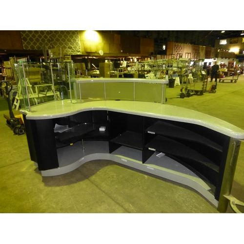 1851 - One large cafe counter type unit which is foldable, mobile, and comes with glass shelves, a sink, bo... 