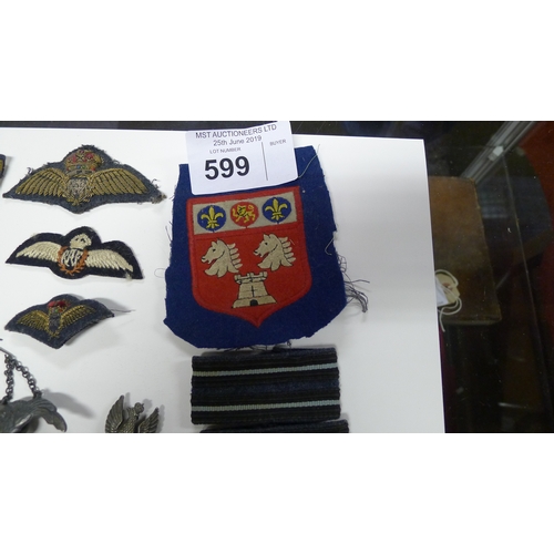 599 - A small quantity of various cap badges and military insignia relating to the Polish Free Airforce 30... 