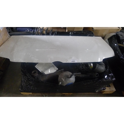 2045 - 1 pallet containing a quantity of VW T5 2008 engine parts and a bonnet including a turbo, DPF, alter... 