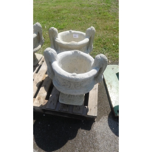 1601 - A pair of large decorative two handled urn type planters