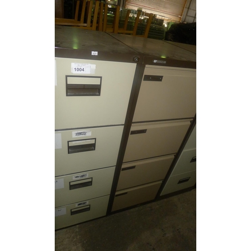 1004 - 2 metal 4 drawer filing cabinets