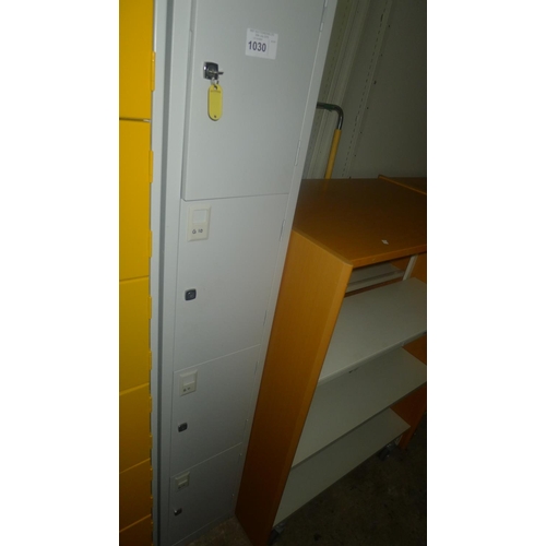 1030 - 1 grey metal 4 door personnel locker supplied with all keys