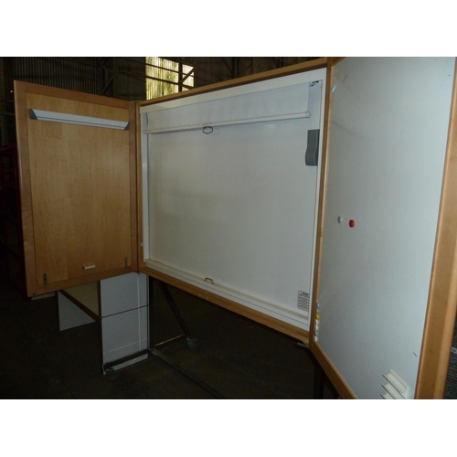 1009 - 1 wheeled unit with 2 large doors containing a magnetic dry wipe board and a pull down projection sc... 